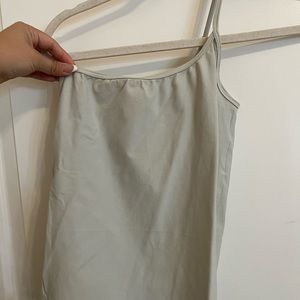 Skims one shoulder bodysuit